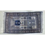 An Eastern Prayer Rug with Religious Architectural Patterns. Wear and Fraying Noted. Length: 170cm