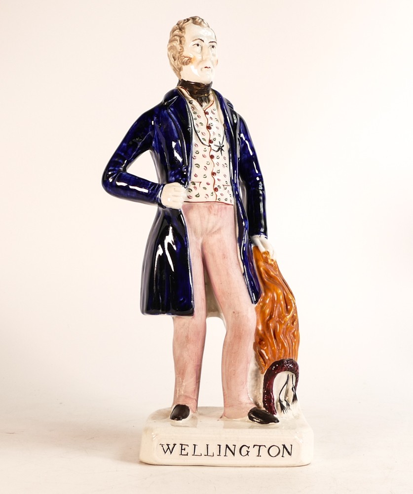Mid-Victorian Staffordshire figure depicting Arthur Wellesley, The Duke of Wellington. Firing