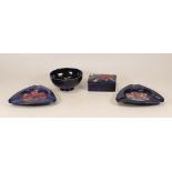 A collection of Moorcroft to include Orchid lidded box, small Anemone footed bowl and two