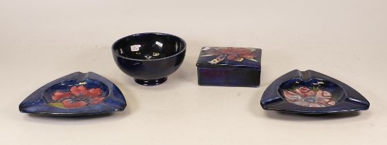 A collection of Moorcroft to include Orchid lidded box, small Anemone footed bowl and two