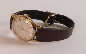 BAUME 9ct gold hallmarked gents wrist watch, manual wind mechanism. Wins, ticks, sets & runs, back