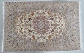 A Persian Style Floor Rug with Animal Patterns. Length: 170cm Width: 110cm