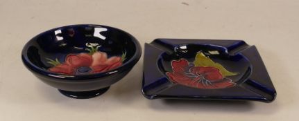 Moorcroft Hibiscus on blue ash tray together with Anemone small footed bowl. (2)
