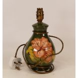 Moorcroft Hibiscus on green lamp base. Height including fitting 25.5cm