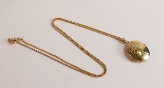 9ct gold oval locket and chain, 4g.