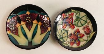 Two Moorcroft pin dishes to include Orchid trillion and Palmata . Boxed