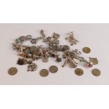 Two Silver charm bracelets together with single charms, pre 1920 silver coins etc, 106g.