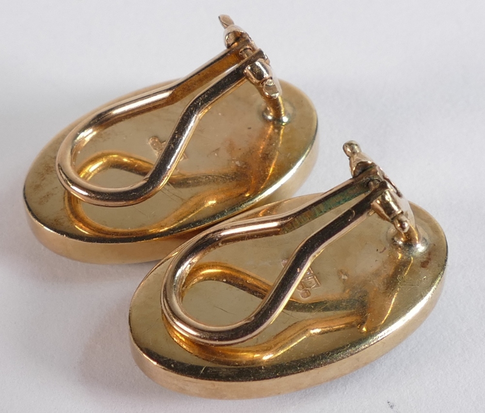 Pair 9ct gold gold earrings each set with oval green possible Jade stones, 7.7g. - Image 2 of 3