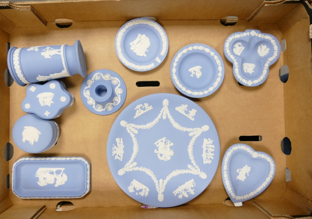 A collection of Wedgwood blue jasperware pin dishes , spill vase, plate, lidded boxes