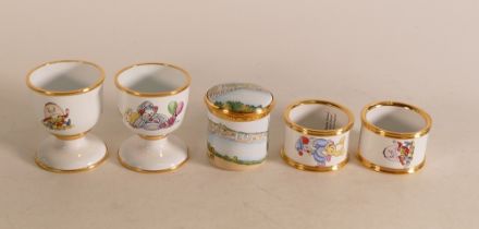 Kingsley enamelled matching humpty dumpty egg cup and napkin ring , matching clown egg cup and