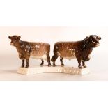 Beswick Dairy Shorthorn bull and cow mounted on ceramic base 1863. 'Presented by Dairy Farmer