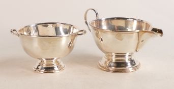 Silver hallmarked non matching sugar bowl & cream jug in good overall used condition, weight 158g.