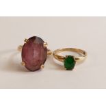 Two 9ct gold ladies dress rings, one set with oval green stone,size L and the other set with oval