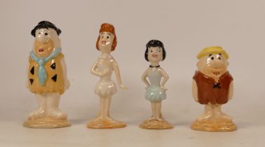 Beswick figures Fred, Betty Rubble, Barney Rubble and Wilma Flintstone . All number 228 of 2000 ,