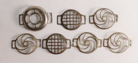 WWI period trench art / watch glass shrapnel protectors in various designs x 7. Considered scarce