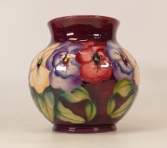 Moorcroft Pansy patterned vase, designed by Rachel Bishop, height 15cm (silver lined seconds)