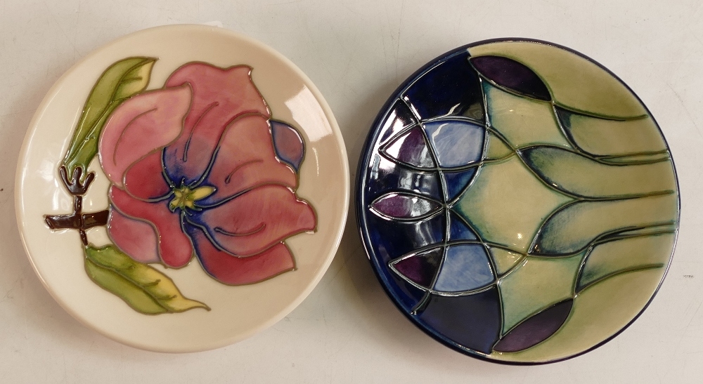 Two Moorcroft pin dishes to include Pink Magnolia ( limited edition 75/94 and Indigo ( silver lined)
