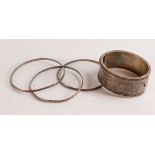 Victorian un-hallmarked silver bangle, together with 3 modern bangles stamped 'silver', 46.6g.