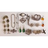 Collection of sterling silver jewellery including brooches, earrings, bracelets. All appears to be
