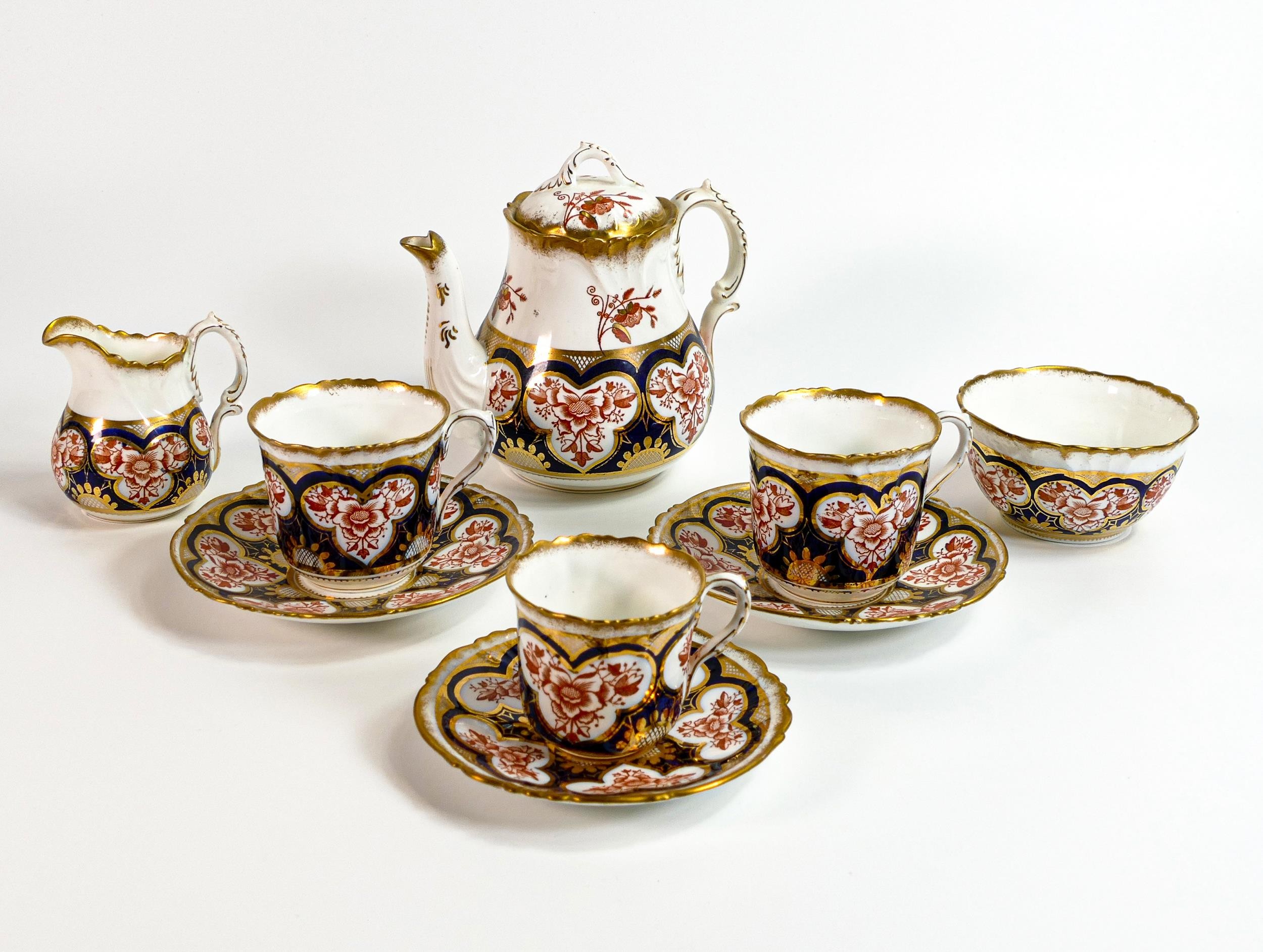 Wileman & Foley part tea for two set. Pattern 7019 to include tea pot, 2 cups & saucers, cream