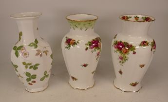 Two Royal Albert Old Country Roses vases together with one Wedgwood Wild Strawberry, height of