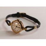 Ladies Bernex 9ct gold cocktail watch with leather strap.