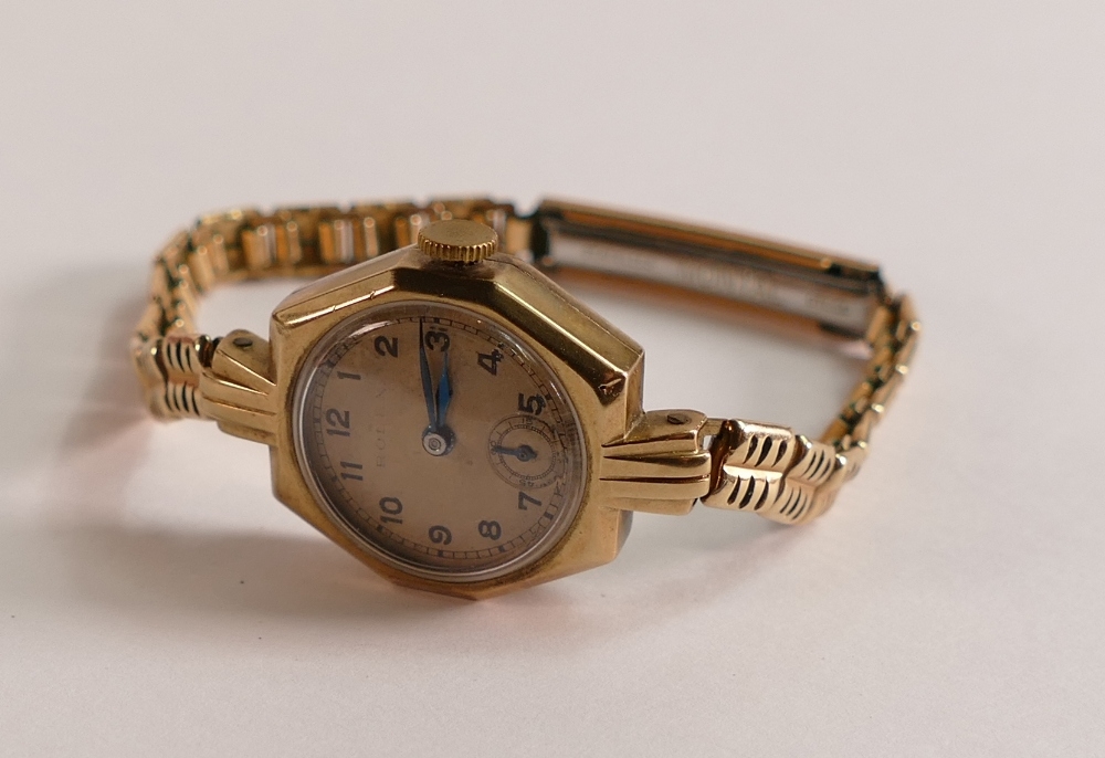 9ct gold ladies Rolex wristwatch with hexagonal case with gold plated bracelet, inner case and works