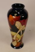 Moorcroft Parasol Dance vase . Height 21cm , dated 2005. Red dot seconds