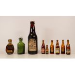 A collection of vintage miniature bottles of Guinness , Harp lager , dimple together with a bottle