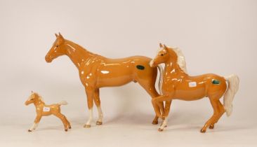 Beswick Prancing Arab Palomino together with Palomino Bois Roussel and Palomino Foal (3)