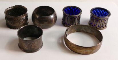 Group of silver including pair of salts, 3 x napkin rings & a bangle, weighable silver 93.4g.
