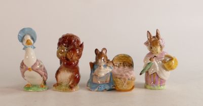 Four Beswick Beatrix Potter BP2 figures to include Mrs Rabbit, Squirrel Nutkin (a/f), Hunca Munca