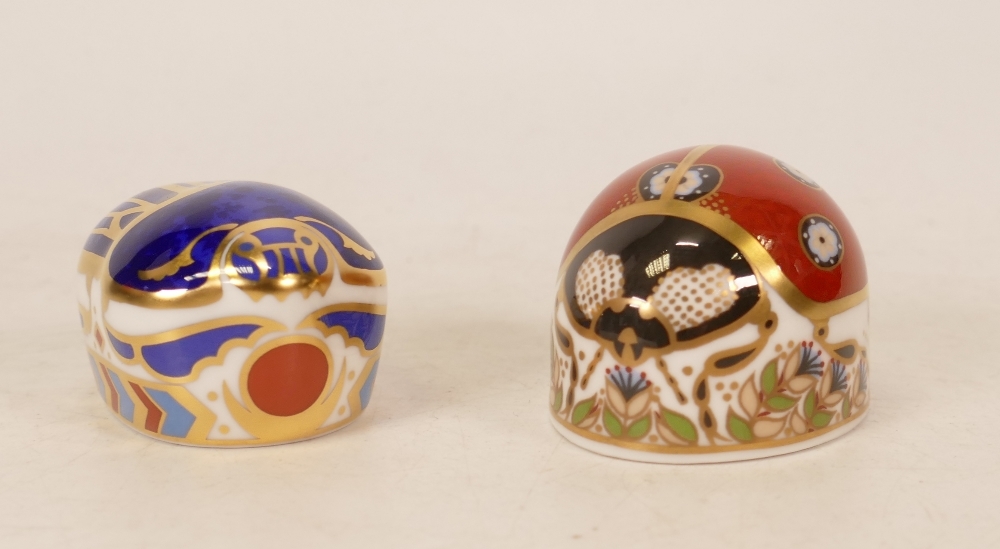 Royal Crown Derby paperweights seven Spot Lady Bird & Millennium Bug , gold stoppers, each boxed (2)