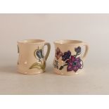 Two Moorcroft mugs to include bluebell (crazed) and Mcc 1998 (2)