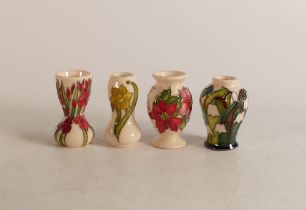 Four Moorcroft flower of the month miniature vases, snowdrop seconds.