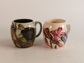 Two Moorcroft mugs to include Blackbird and butterflies & moths (2)