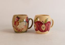 Two Moorcroft mugs to include red apples and Cockerel at sunrise (2)
