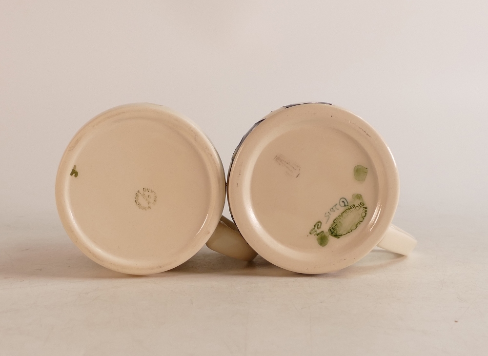 Two Moorcroft mugs to include Christmas penguins and yellow floral mig (2) - Image 2 of 2