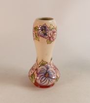 Moorcroft trial vase decorated with pink and purple flowers . Trail dated 10/11/17. Height 24cm