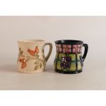 Two Moorcroft mugs to include Rosehip and Violets (2)