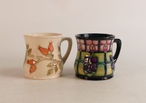 Two Moorcroft mugs to include Rosehip and Violets (2)