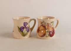 Two Moorcroft mugs to include Iris and Butterflies (2)