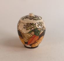 Moorcroft biscuit barrel decorated with pumpkins, dated March 2017. Height 17cm