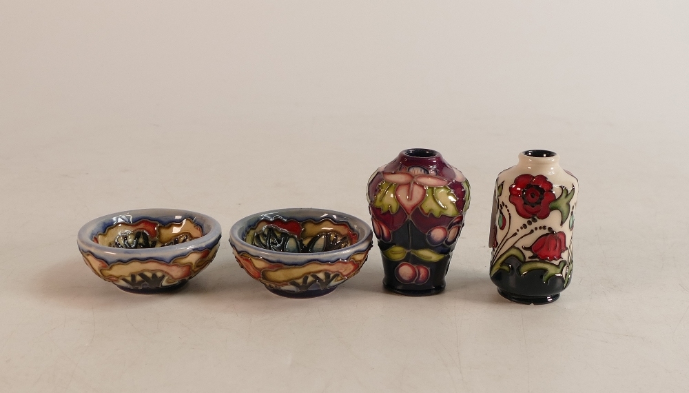 Two Moorcroft miniature bowls together with Wild Poppy Dance vase and Fuchsia vase, height 5.5cm (4)