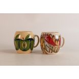 Two Moorcroft mugs to include Toadstools and Apples (2)