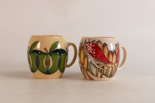 Two Moorcroft mugs to include Toadstools and Apples (2)