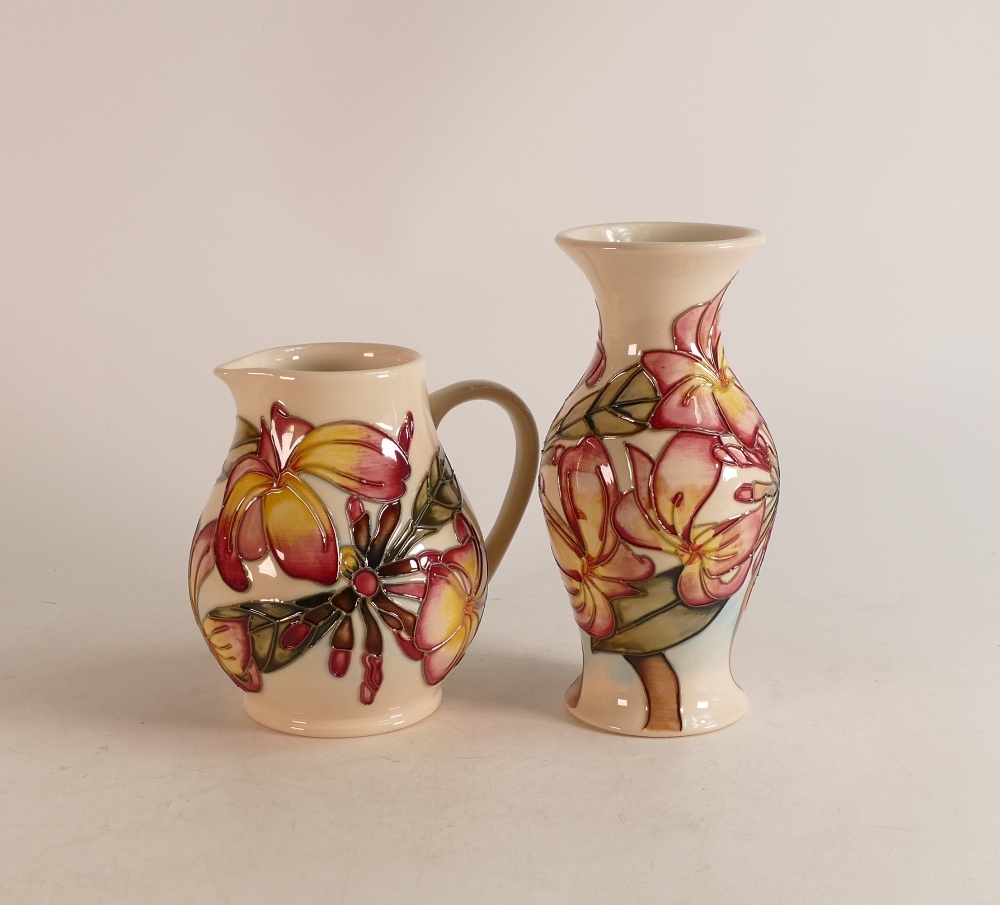 Moorcroft Frangipani vase with matching jug. Height of tallest 19cm