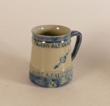 A William Moorcroft commemorative mug, coronation of Edward VII and Queen Alexandra 1902, designed