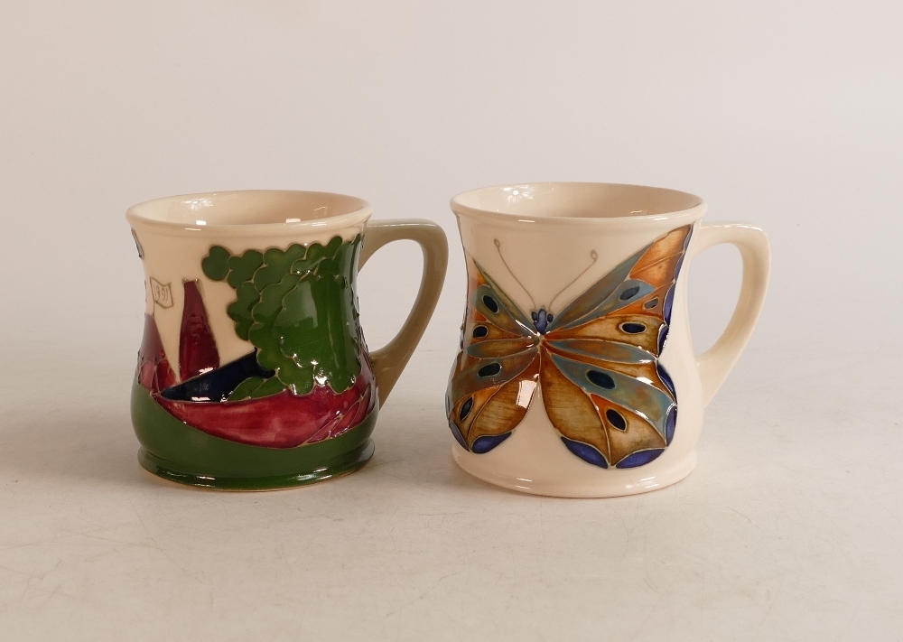 Two Moorcroft mugs to include MCC 1991 and Butterfly (crazed)