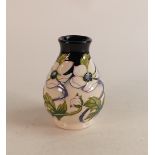 Moorcroft white/ pink floral vase on white/blue faded ground, number edition 25, signed Nicola